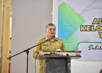 Yusran Anizam saat membuka kegiatan Advokasi, Koordinasi, dan Bimbingan Teknis (Bimtek) bagi Kelompok Kerja Tim Pembina Posyandu Tingkat Kabupaten, yang berlangsung di Aula Hotel Dangau Kubu Raya, Senin (16/6/2025).