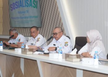 Plt Kepala Dinas Komunikasi dan Informatika Kota Pontianak Yusnaldi saat membuka sosialisasi kebijakan teknologi informasi dan komunikasi (TIK) dan Manajemen Keamanan Informasi.
