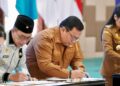Wakil Bupati Sukiryanto menandatangi kerjasama dengan Perguruan Tinggi dan Kementerian Hukum. Kolaborasi ini untuk pengembangan produk lokal.