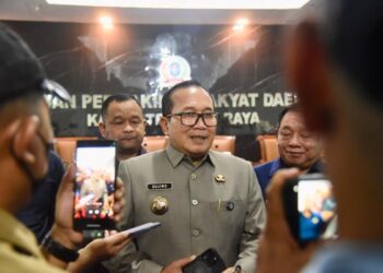 Sujiwo usai menghadiri rapat paripurna pertanggungjawaban pelaksanaan APBD Kabupaten Kubu Raya Tahun Anggaran 2025 di Ruang Sidang DPRD Kubu Raya, Jumat (19/6/2026).