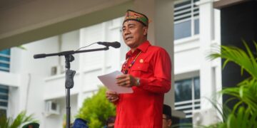 Krisantus saat menghadiri Upacara Peringatan HUT ke-19 Kabupaten Kubu Raya di halaman Kantor Bupati Kubu Raya, Jumat (17/7/2026).