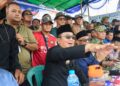 Sujiwo saat menyaksikan langsung lomba di Sungai Kakap, Rabu (12/8/2026).